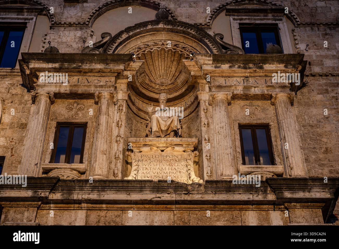 The Palazzo dei Capitani del Popolo is one of the best known historical buildings in Ascoli Piceno. With its medieval crenellated tower it rises next - Stock Image