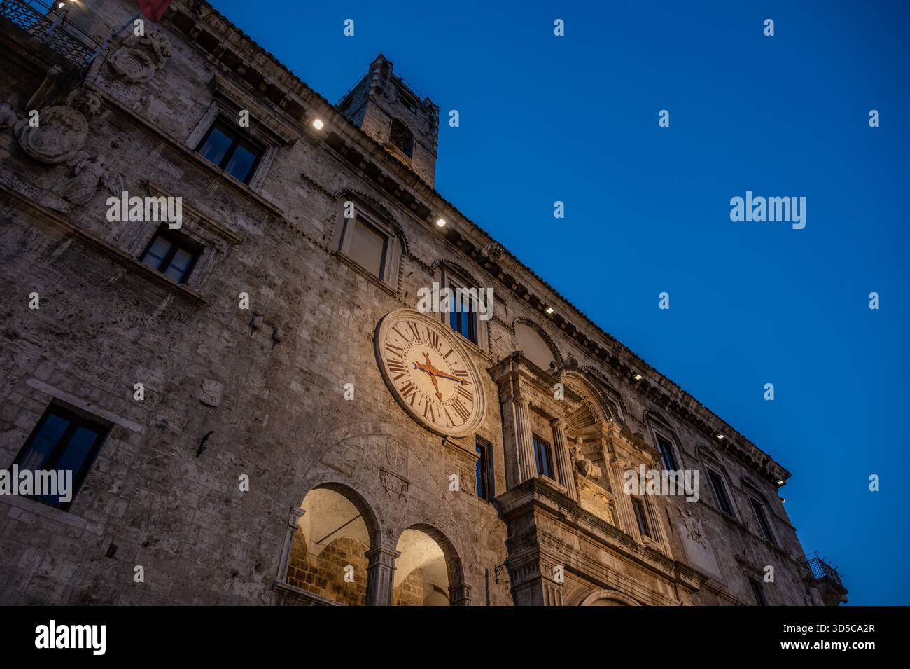 The Palazzo dei Capitani del Popolo is one of the best known historical buildings in Ascoli Piceno. With its medieval crenellated tower it rises next - Stock Image