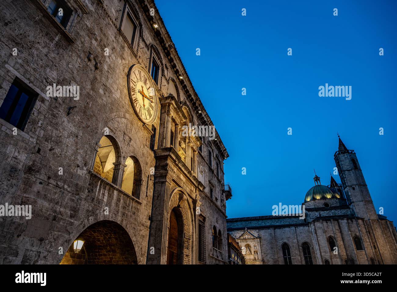 The Palazzo dei Capitani del Popolo is one of the best known historical buildings in Ascoli Piceno. With its medieval crenellated tower it rises next - Stock Image