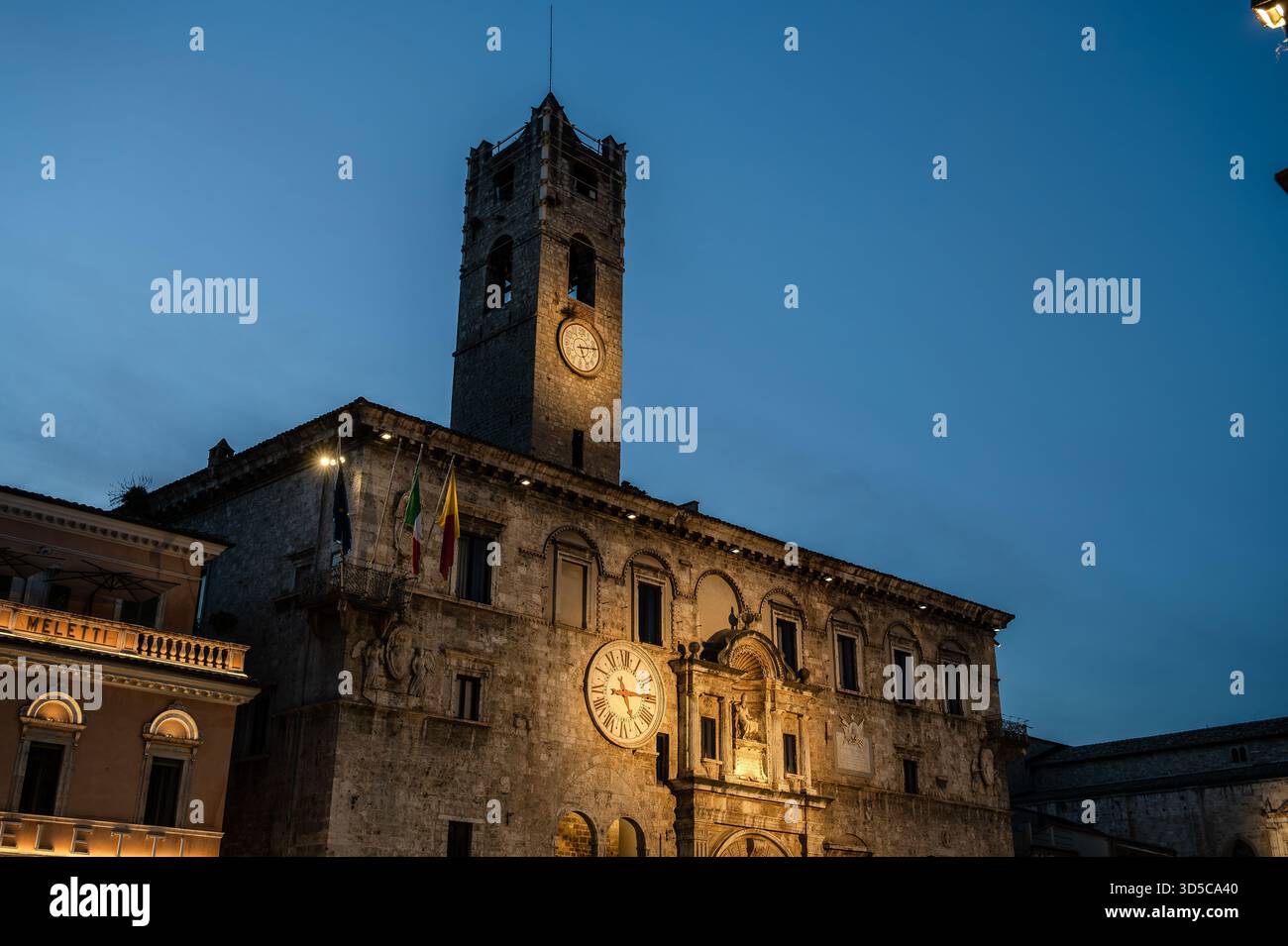 The Palazzo dei Capitani del Popolo is one of the best known historical buildings in Ascoli Piceno. With its medieval crenellated tower it rises next - Stock Image