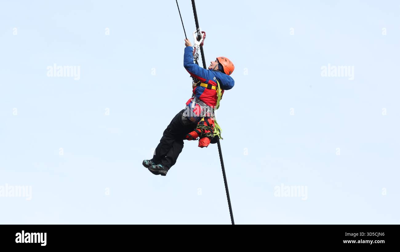 Eibenstock, Germany. 15th Nov, 2025. Members of the DRK Mountain Rescue Service Saxony practise evacuating people on a ski lift. Credit: Bodo Schackow/dpa/Alamy Live News Stock Photo