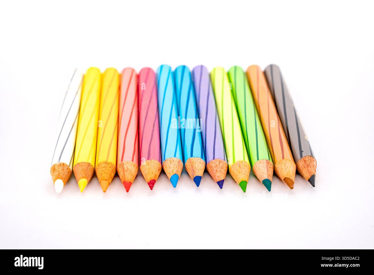 Multi colour pencils on white background Stock Photo