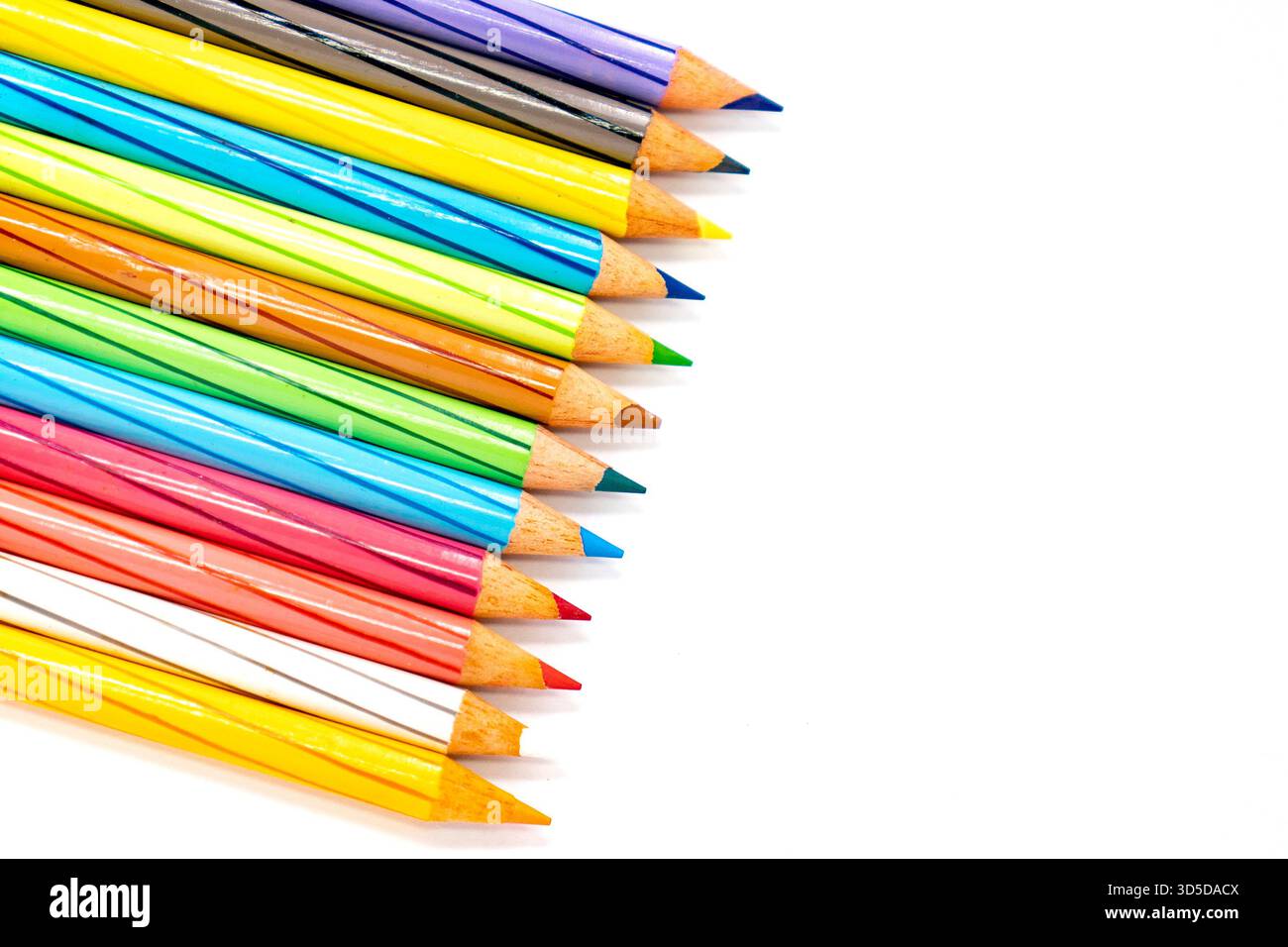 Multi colour pencils on white background Stock Photo