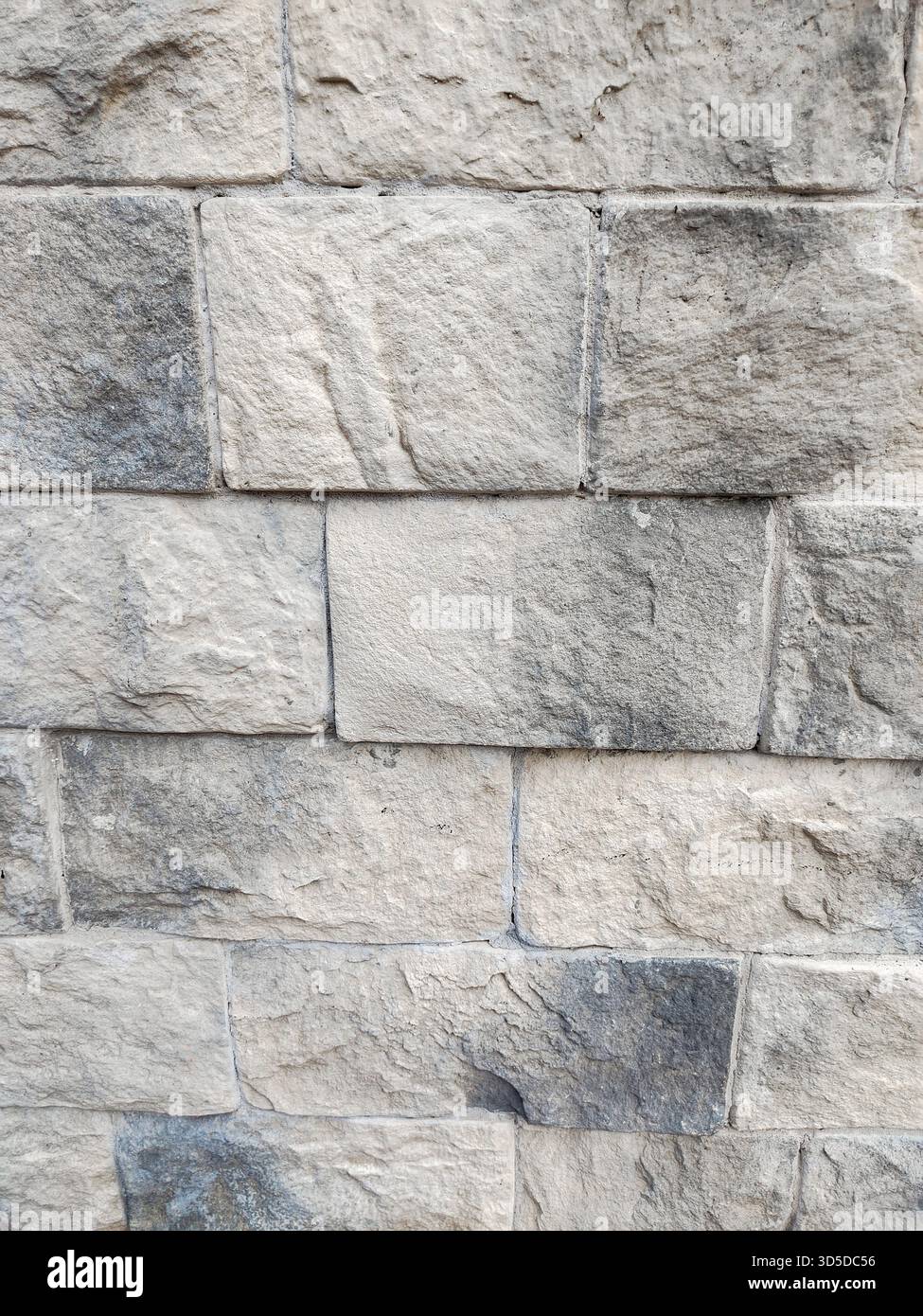 Light gray rectangular stone masonry texture vertical image great background for packaging posters web banners and architecture presentations Stock Photo