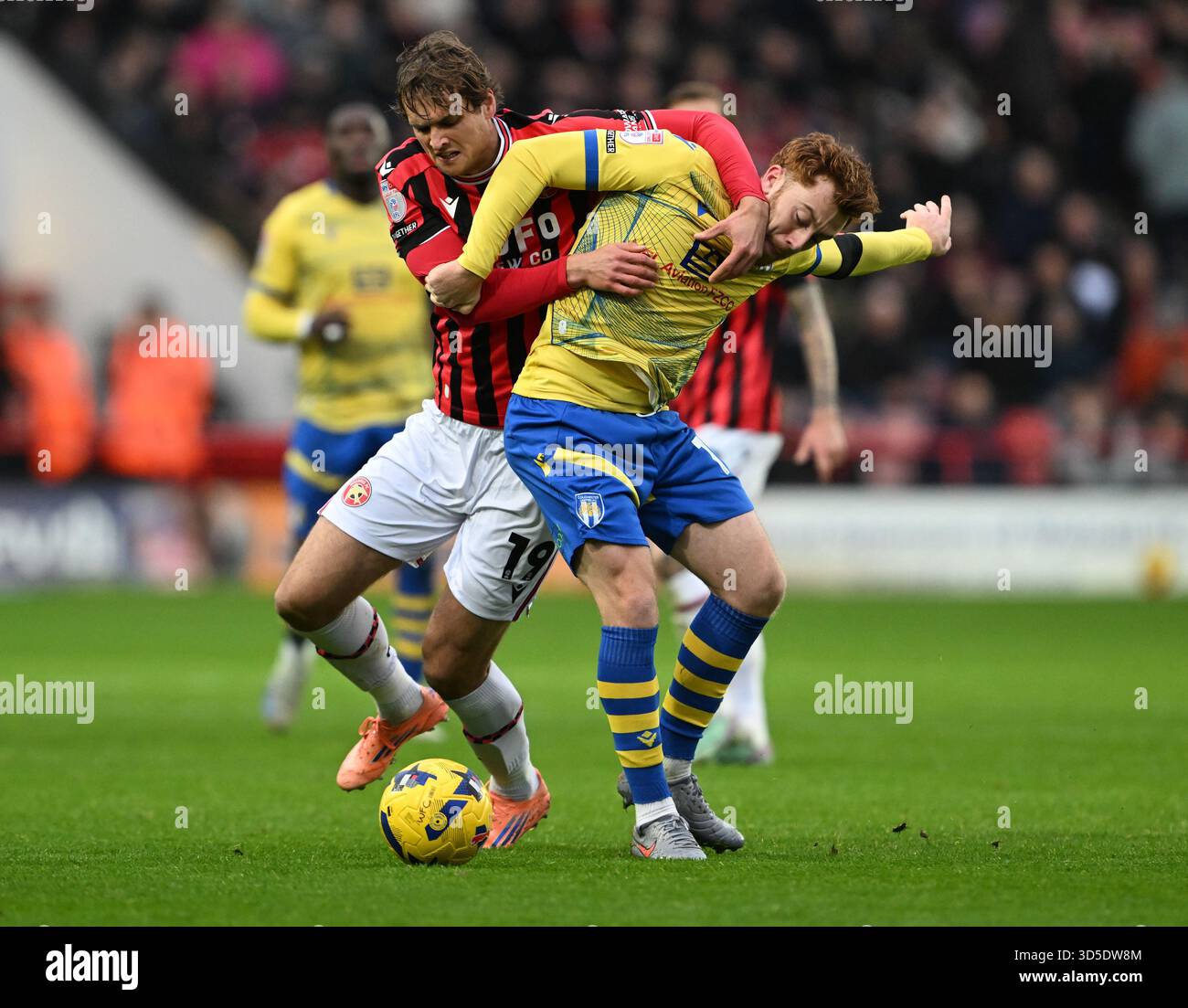 Walsall's Aaron Pressley (left) and Colchester United's Arthur Read ...
