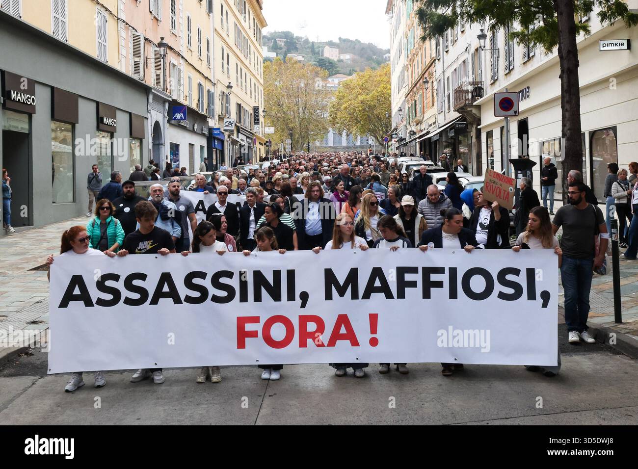 Collectives and unions member of the 'anti-Mafia coordination' demonstrate against organized crime in Bastia, Corsica, France on Saturday, November 15, 2025. The new movement, called 'anti-mafia coordination,' was created to broaden the fight against organized crime throughout Corsican society aiming to show their 'rejection of mafia control,' in line with the resolution and deliberation against 'abuses' and 'mafia practices' voted by the Corsican Assembly in November 2022 and February 2025. At the same time, the Umani Foundation is inviting the population to wear white on Saturday, November 1 Stock Photo