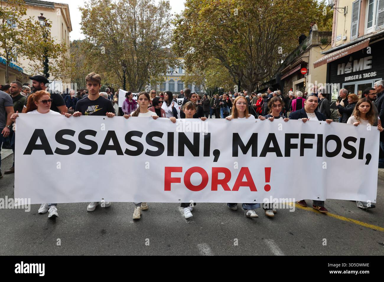 Collectives and unions member of the 'anti-Mafia coordination' demonstrate against organized crime in Bastia, Corsica, France on Saturday, November 15, 2025. The new movement, called 'anti-mafia coordination,' was created to broaden the fight against organized crime throughout Corsican society aiming to show their 'rejection of mafia control,' in line with the resolution and deliberation against 'abuses' and 'mafia practices' voted by the Corsican Assembly in November 2022 and February 2025. At the same time, the Umani Foundation is inviting the population to wear white on Saturday, November 1 Stock Photo