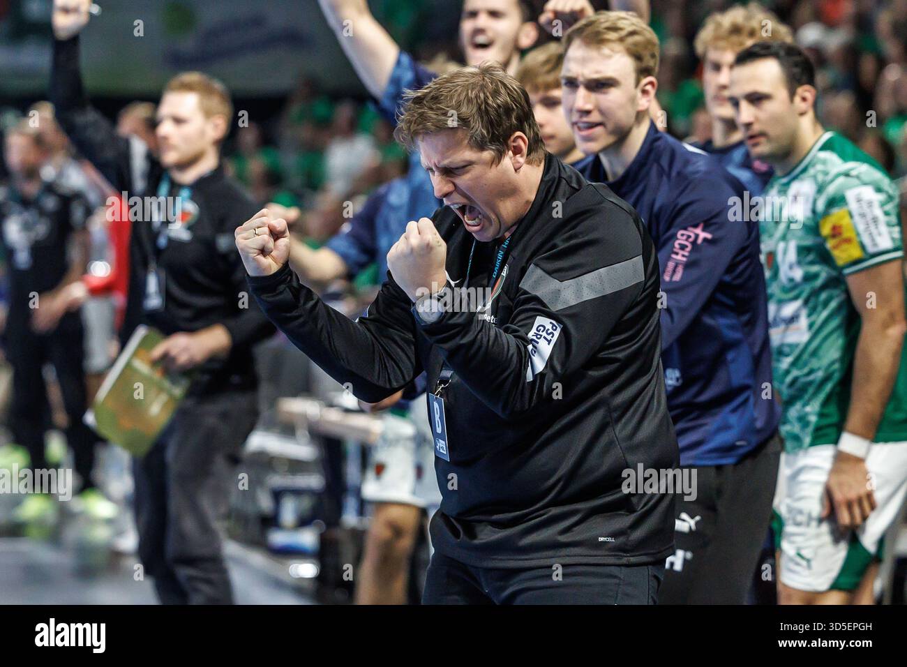 Berlin, Germany. 15th Nov, 2025. Handball: Bundesliga, Füchse Berlin - THW Kiel, Matchday 12, Max-Schmeling-Halle. Coach Nicolej Krickau (Füchse Berlin) reacts to a goal. Credit: Andreas Gora/dpa/Alamy Live News Stock Photo
