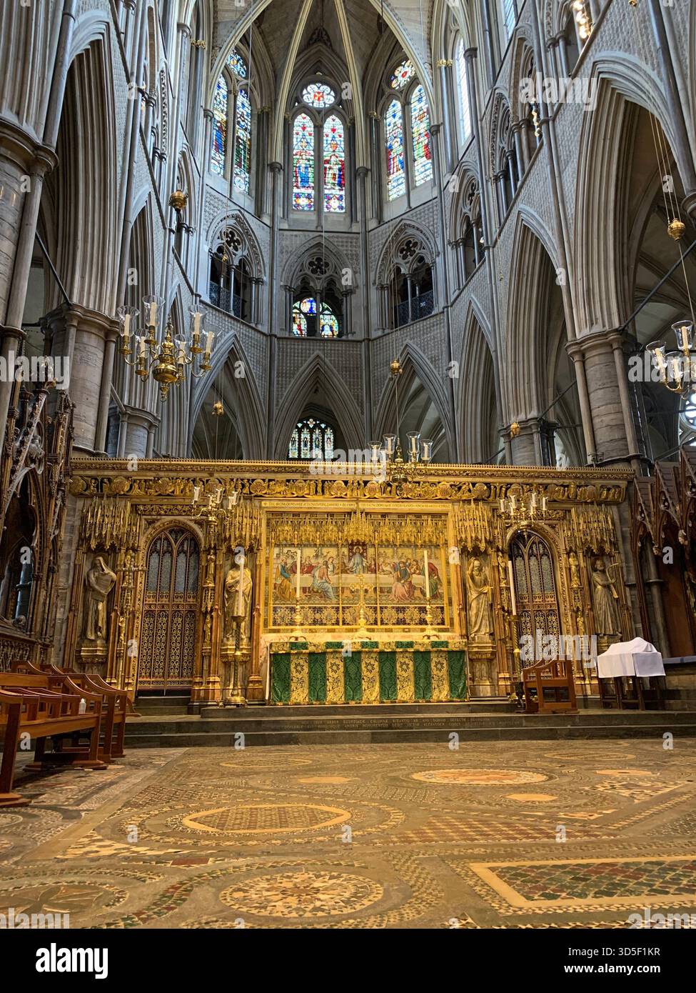 Ornate high altar inside Westminster Abbey in London, England. Richly decorated Gothic interior reflecting centuries of British royal ceremonies - Smartphone Captured Stock Image
