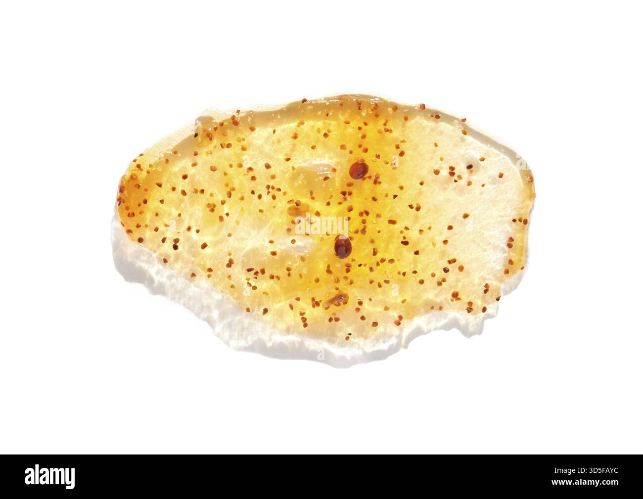 Rust colored gel on white background with seeds description and texture surface close up Stock Photo