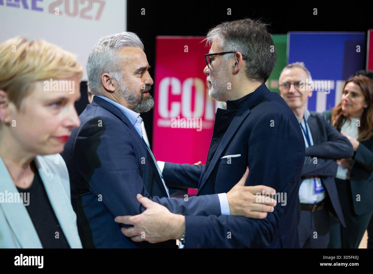 French deputy and general secretary of the french socialist party Olivier Faure speaks to Ecologiste et Social's MP Alexis Corbiere during a convention of the Front Populaire 2027 (Popular Front 2027), focused on education in Trappes, outside Paris on November 15, 2025. The united left, which is advocating a joint candidate for the 2027 presidential election, met on Saturday in Trappes to demonstrate its unbreakable unity in the face of the far right, announcing that a primary election would be held in 'autumn 2026'. Photo by Raphael Lafargue/ABACAPRESS.COM Stock Photo