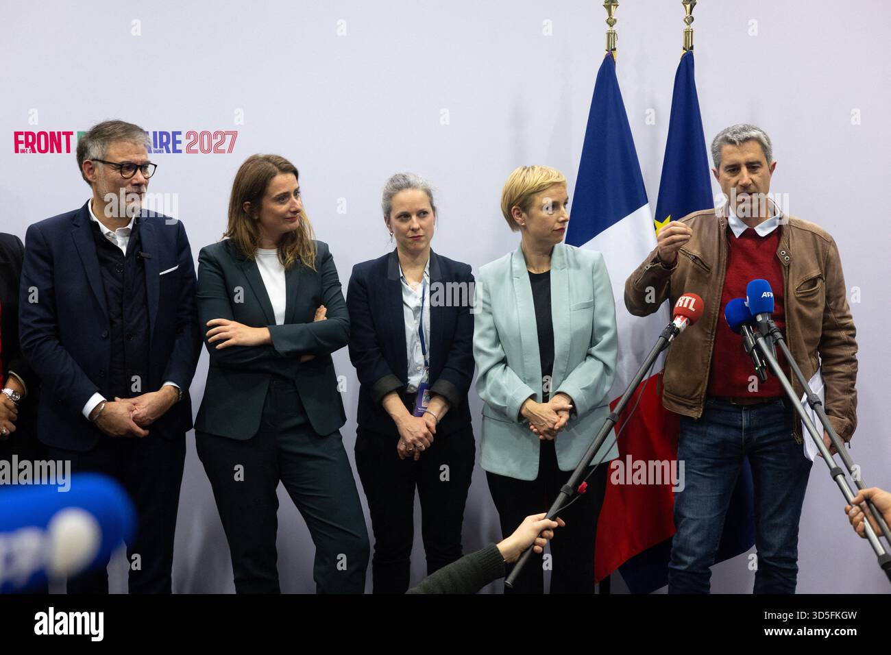 French civil servant and economist associated with the Socialist Party Lucie Castets, National secretary of French left-wing party The Ecologistes Marine Tondelier, Ecologiste et Social's MP Francois Ruffin, Ecologiste et Social's MP Clementine Autain, French deputy and general secretary of the french socialist party Olivier Faure speaks to the press during a convention of the Front Populaire 2027 (Popular Front 2027), focused on education in Trappes, outside Paris on November 15, 2025. The united left, which is advocating a joint candidate for the 2027 presidential election, met on Saturday i Stock Photo