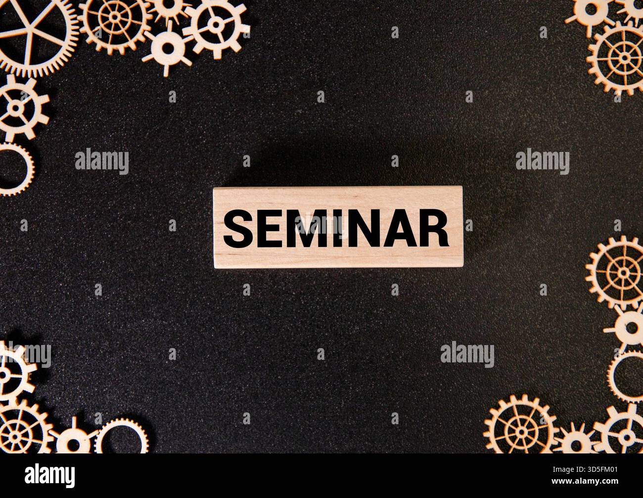 Hand writing Seminar topic on chalkboard Stock Photo