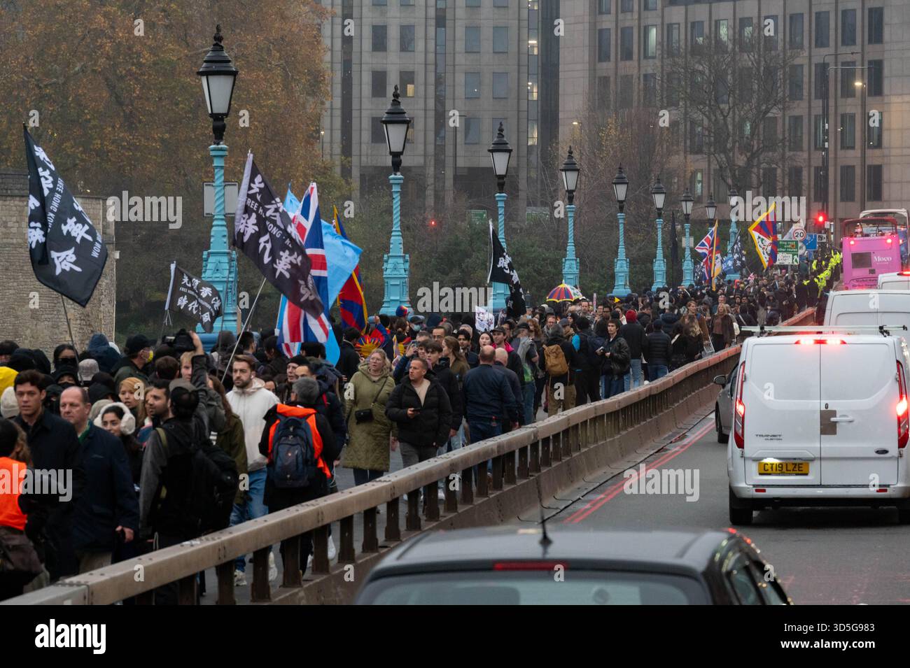 Protesters make a human chain at Tower Bridge during the demonstration ...