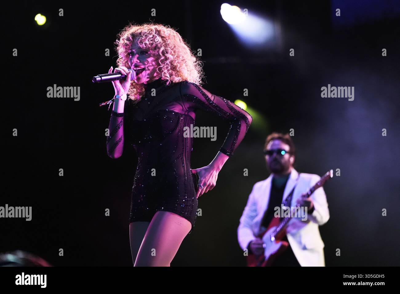 Michelle Joy, vocalist for the band Cannons, performs during the Corona ...