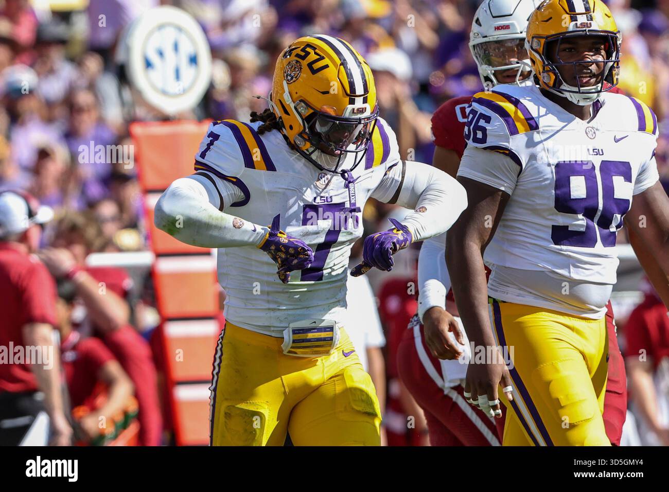 November 15, 2025: LSU linebacker Harold Perkins (7) signals thumbs ...