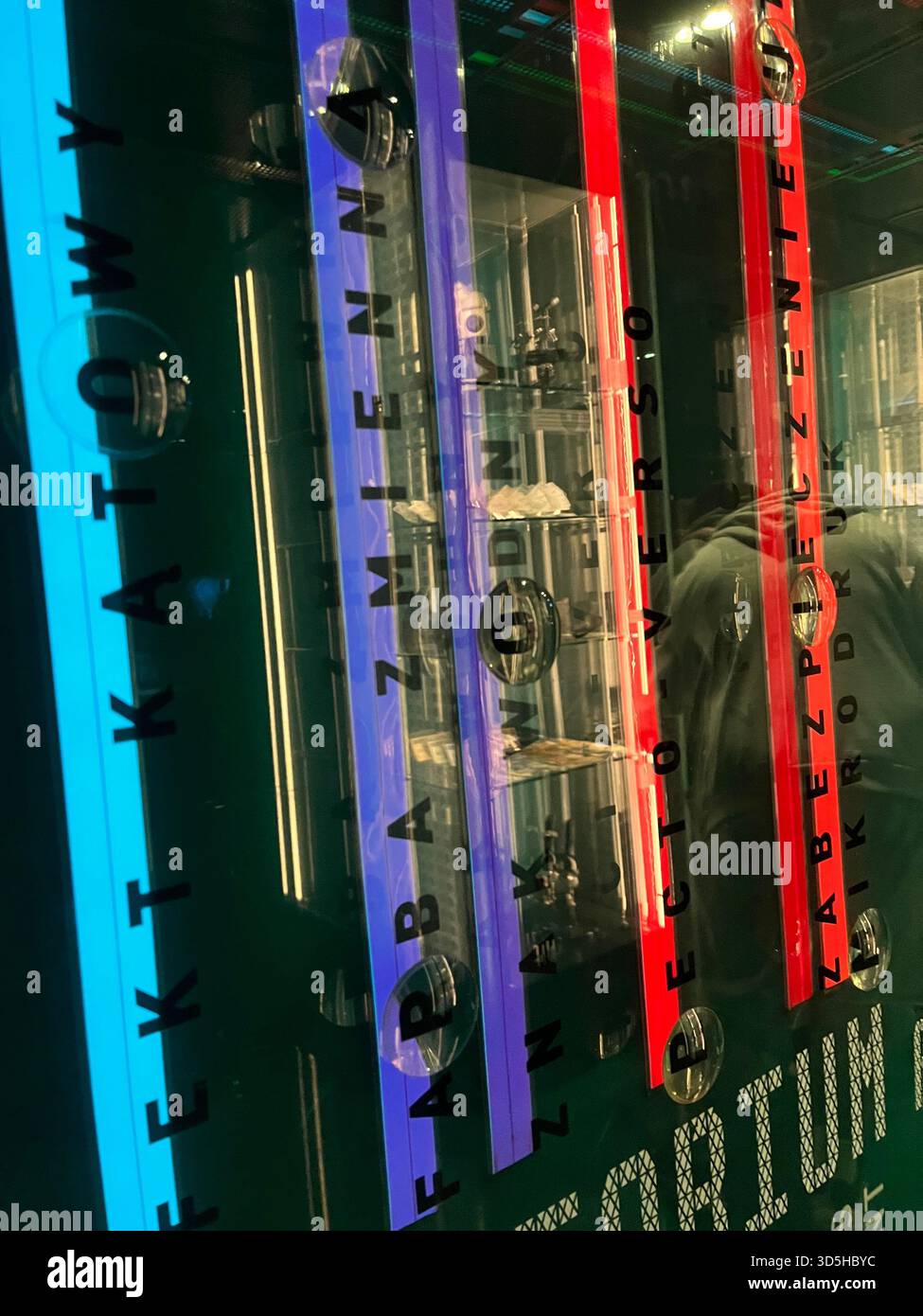 Colorful neon sign inside a modern venue in Warsaw, Poland. Contemporary urban nightlife and creative lighting in the capital city. - Smartphone Captured Stock Image