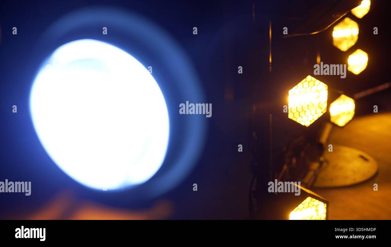 Concert stage lighting abstract with golden bokeh effect Stock Photo