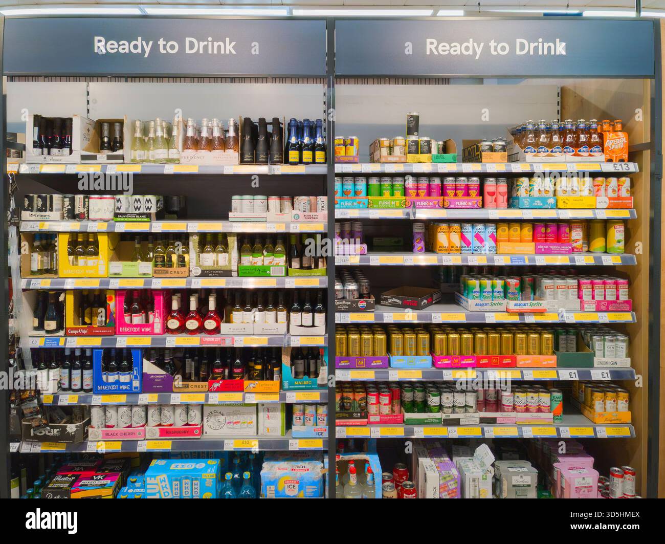 Ready made, premixed drinks, spirits and ready to drink cocktails and small wine bottles on sale at Tesco supermarket, UK. Theme: RTD beverages - Smartphone Captured Stock Image