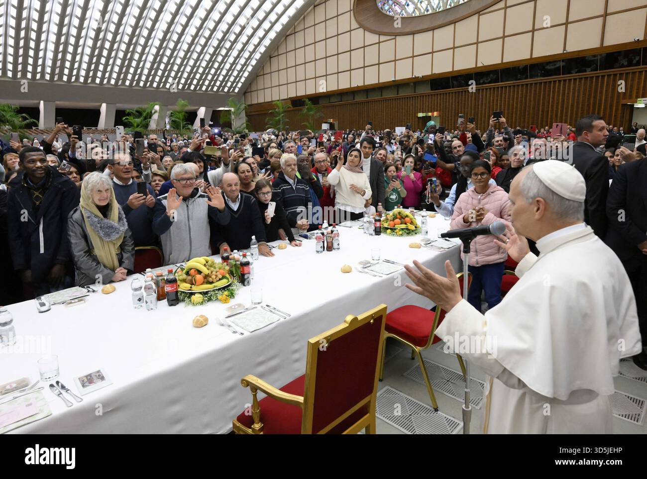 Pope Leo XIV attends a special lunch with indigent people to mark the Jubilee of the Poor on November 16, 2025 at the Vatican. Pope Leo XIV urged leaders of nations to listen to the cry of the poorest. Photo by (EV) Vatican Media/ ABACAPRESS.COM Credit: Abaca Press/Alamy Live News Stock Photo