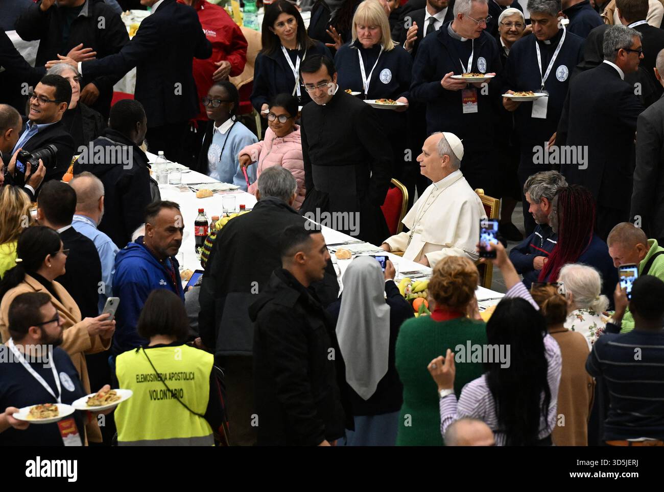 Pope Leo XIV attends a special lunch with indigent people to mark the Jubilee of the Poor on November 16, 2025 at the Vatican. Pope Leo XIV urged leaders of nations to listen to the cry of the poorest. Photo by Eric Vandeville/ABACAPRESS.COM Credit: Abaca Press/Alamy Live News Stock Photo