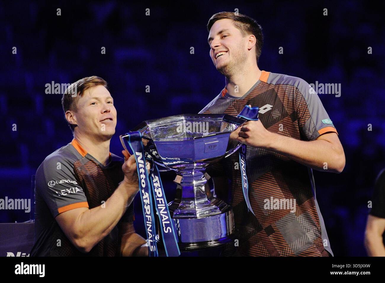 Great Britain's Henry Patten and Finland’s Harri Heliovaara celebrate ...