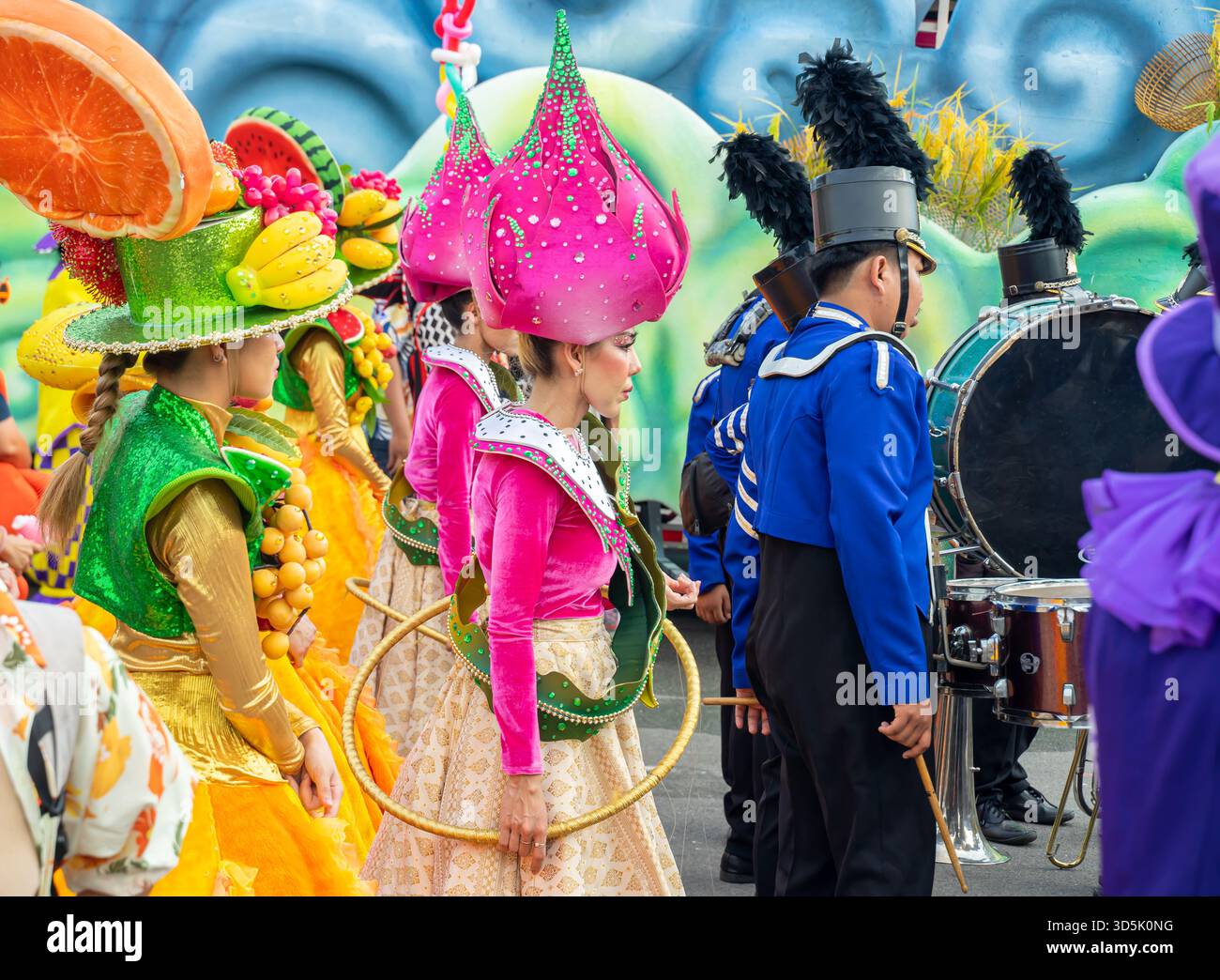 2025 Songkran festival, Bangkok, Thailand. Female participants in fruit dresses Stock Photo