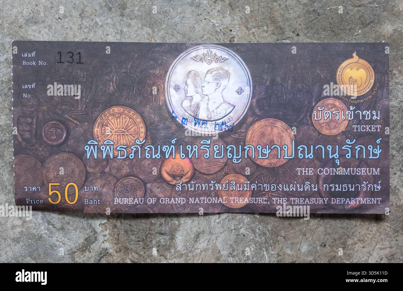 ticket for Coin Museum Thailand operated by the Bureau of Grand National Treasure, the Treasury Department. The price of the ticket is 50 Baht. Stock Photo