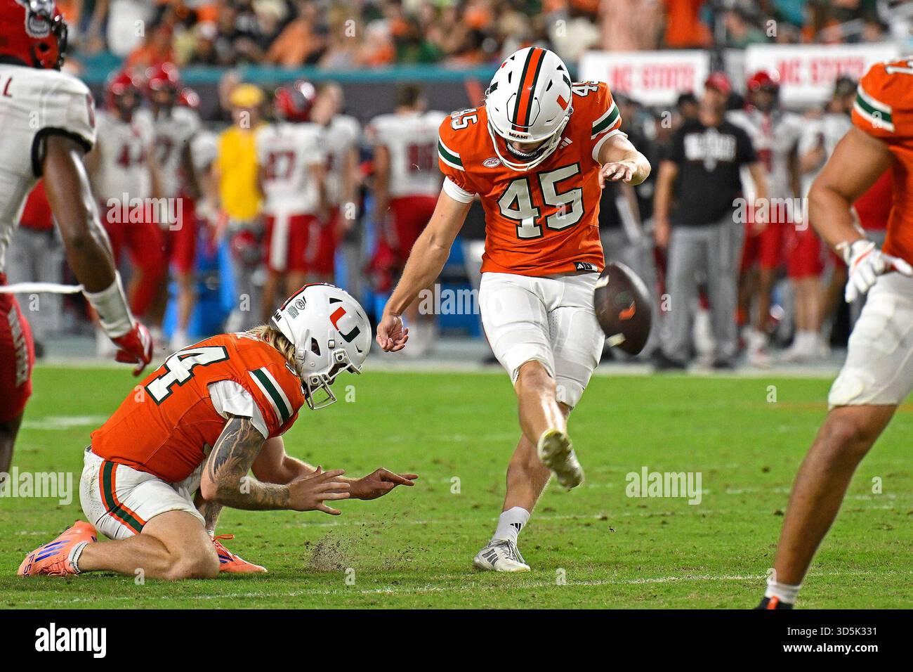 MIAMI GARDENS, FL - NOVEMBER 15: Miami kicker Bert Auburn (45) kicks an ...
