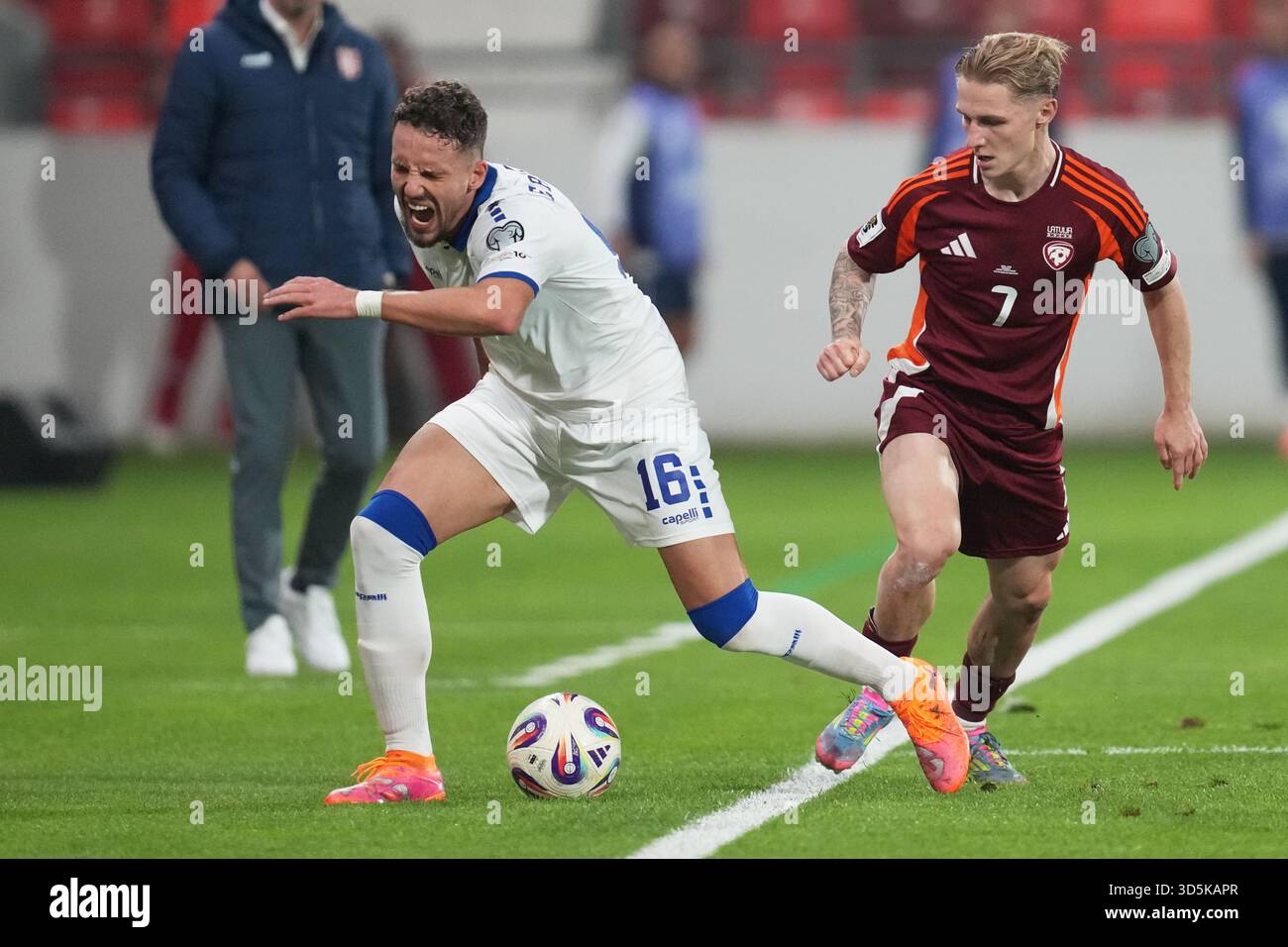 Serbia s Strahinja Erakovic Left Challenges For The Ball With Latvia serbia-s-strahinja-erakovic-left-challenges-for-the-ball-with-latvia