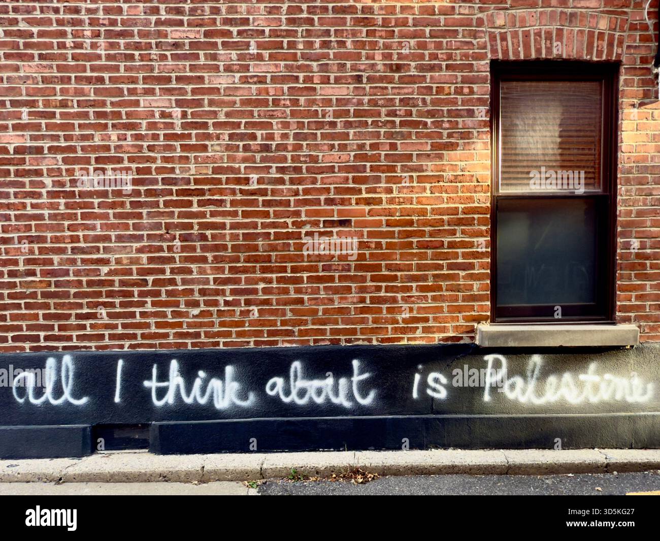 Pro-Palestinian slogan on a house, Montreal, Canada Stock Photo