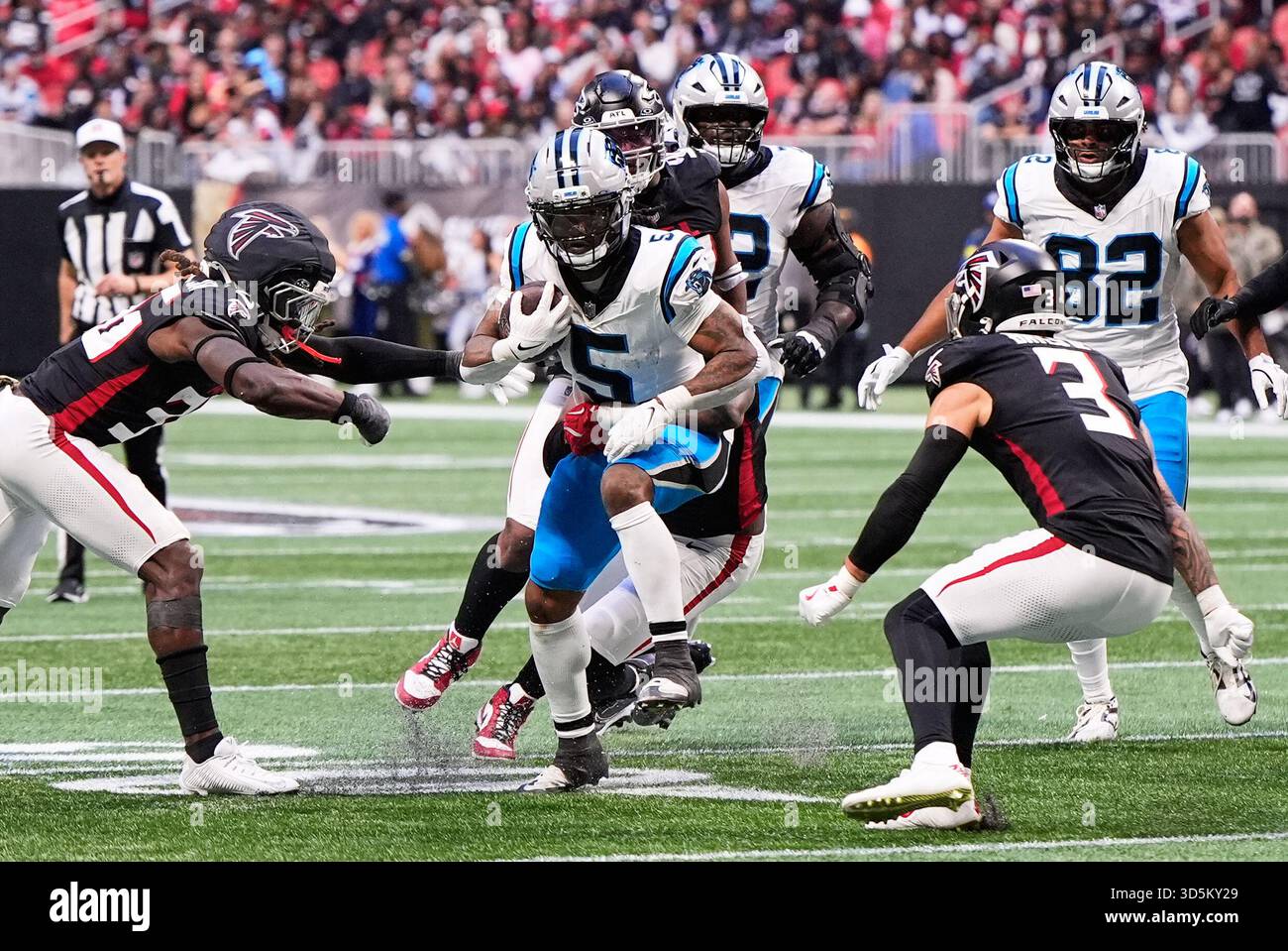 Carolina Panthers running back Rico Dowdle (5) carries between Atlanta ...