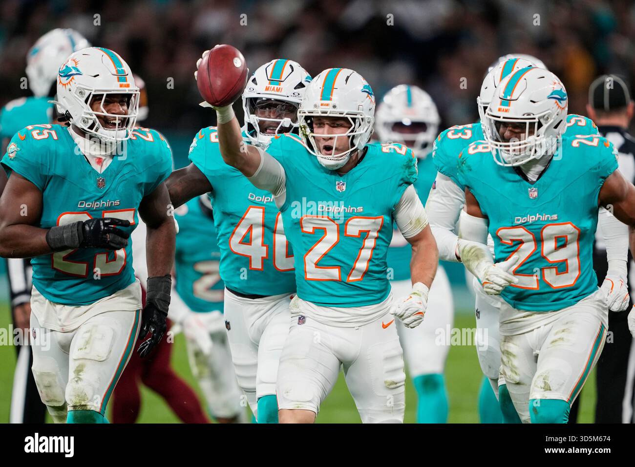 Miami Dolphins defensive back Ethan Bonner (27) celebrates with ...