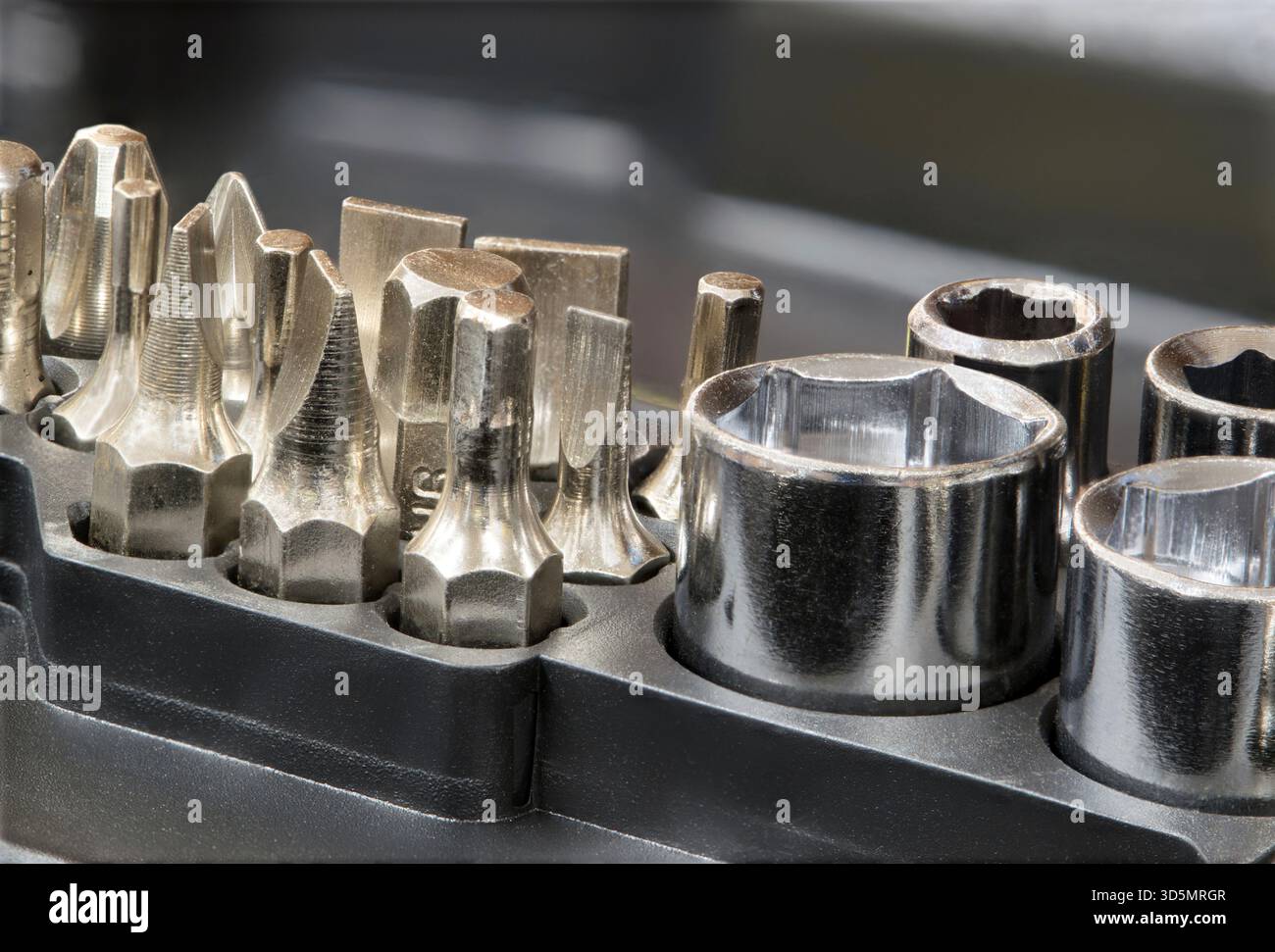 Drill screwdriver bits socket set network tool repair kit metal fastener mechanical components. Stock Photo