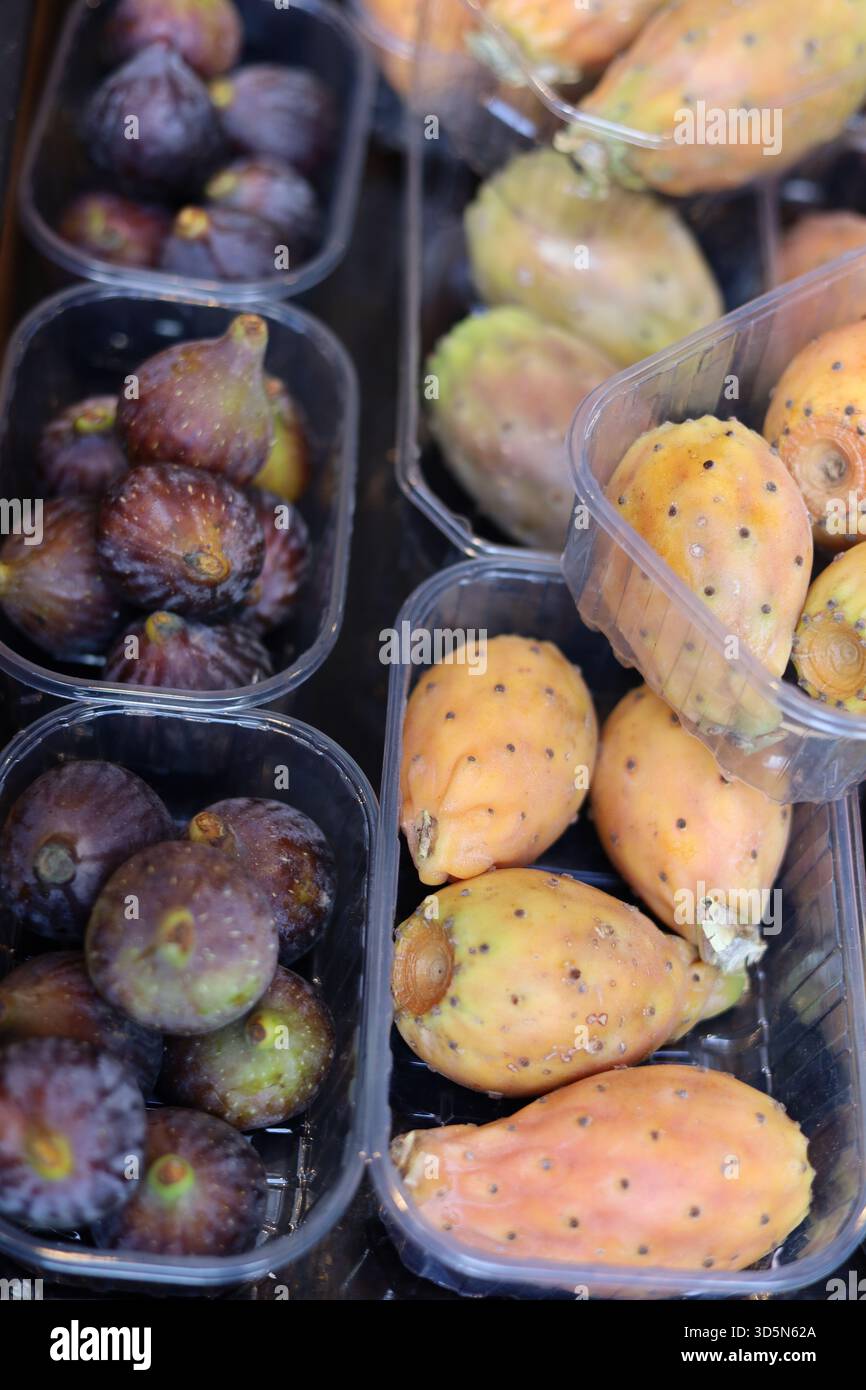 Prickly pear cactus fruit and figs for sale in produce market Stock Photo -  Alamy