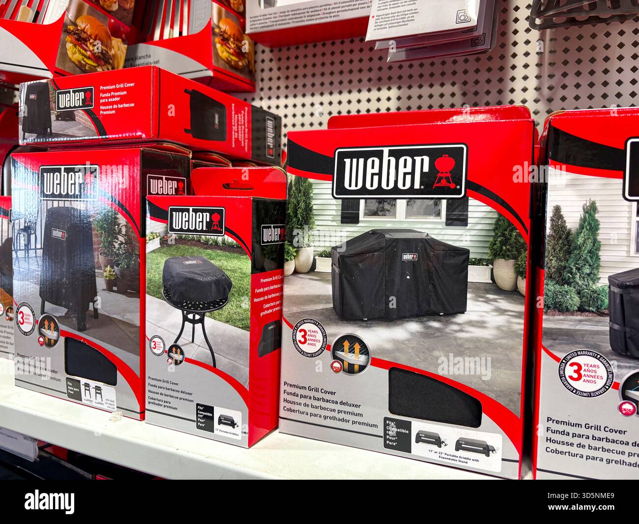 Weber barbecue covers to provide protection to outside garden barbecues, Sydney shop store,Australia - Smartphone Captured Stock Image