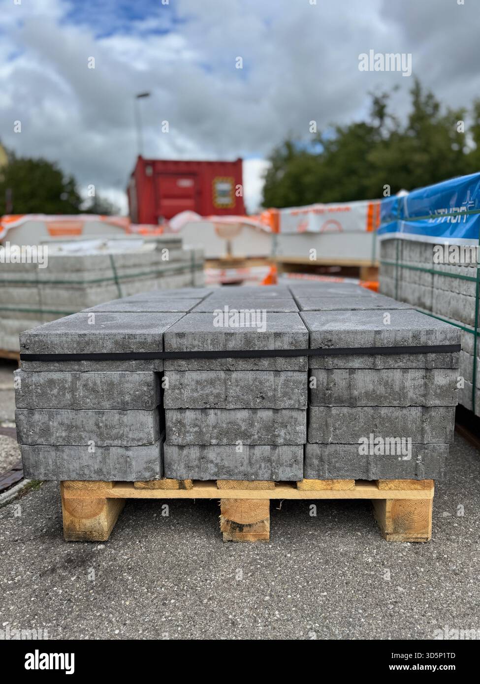 Stack of gray bricks on a pallet Stock Photo - Alamy