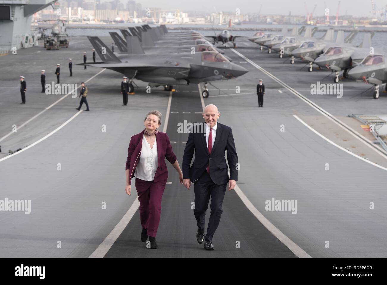 Defence Secretary John Healey and Foreign Secretary Yvette Cooper during a visit to Royal Navy carrier HMS Prince of Wales in Naples, Italy. Britain's aircraft carrier the HMS Prince of Wales has been placed under Nato command in a European first, as the two senior ministers visit Italy to mark the occasion and to hold talks with Italian defence minister Guido Crosetto and foreign minister Antonio Tajani, onboard the ship as it sits off the coast of Naples. Picture date: Monday November 17, 2025. Stock Photo