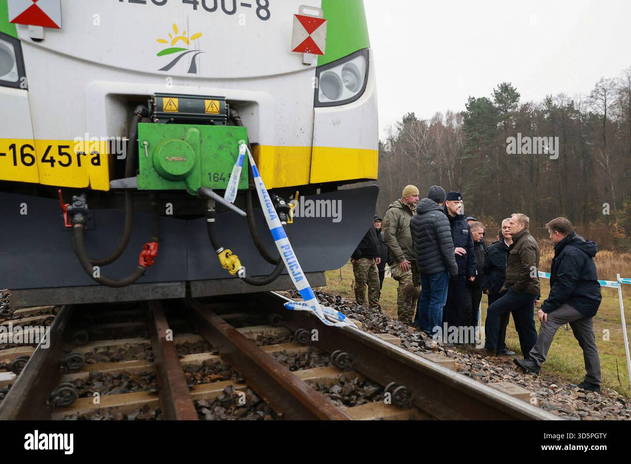 Prime Minister Donald Tusk, second right, visits site of the rail line Mika, that was damaged by sabotage, near Deblin, Poland, Monday, Nov. 17, 2025. (AP Photo/KPRM) Stock Photo