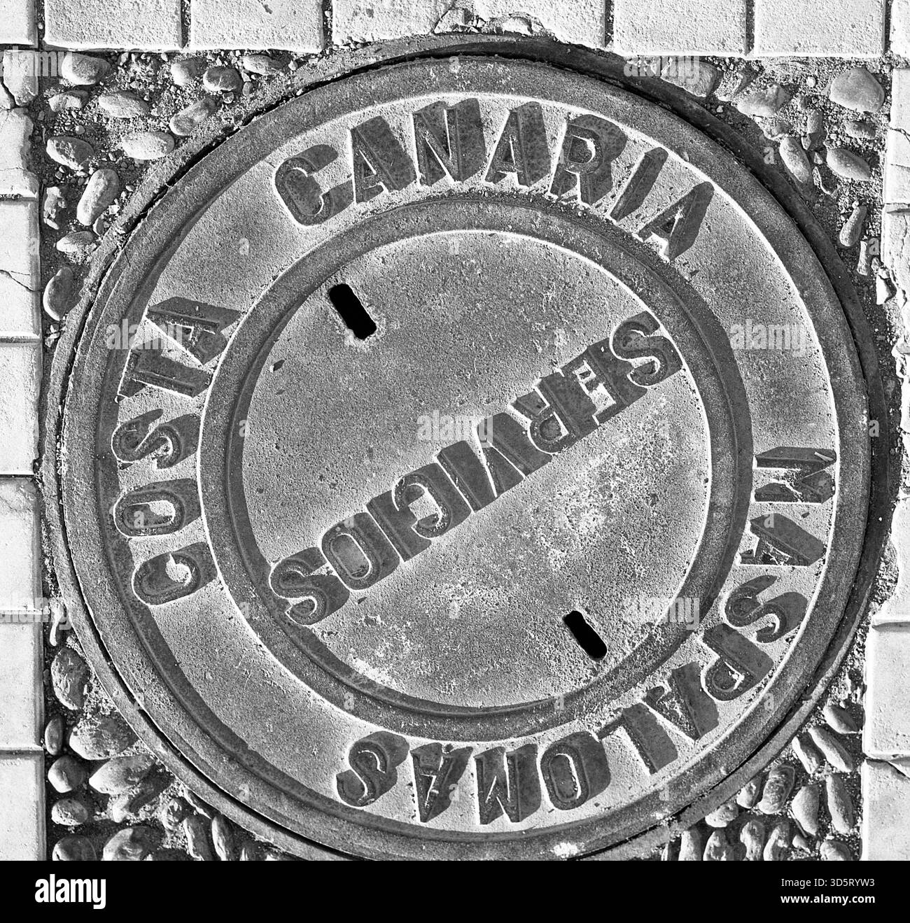 Manhole cover with inscription 1976 [automated translation] Stock Photo ...