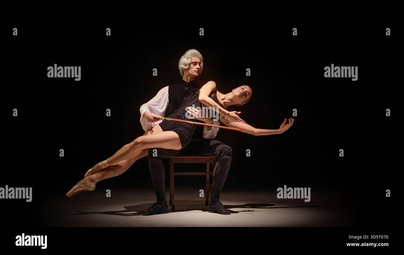 Baroque mentor guiding dancer as human instrument in dramatic stage ...
