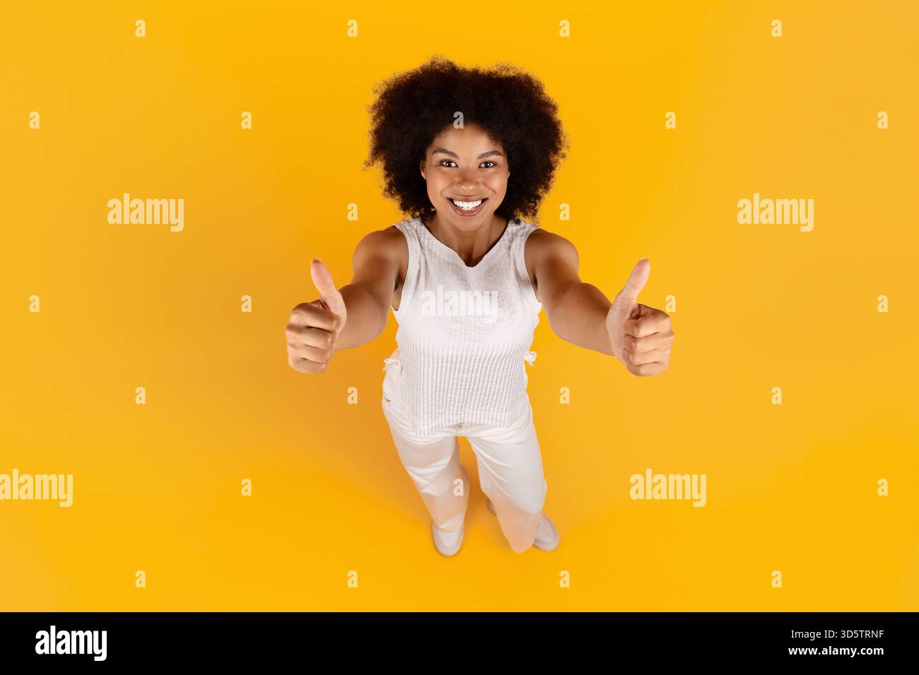 African american woman thumbs up hi-res stock photography and images ...