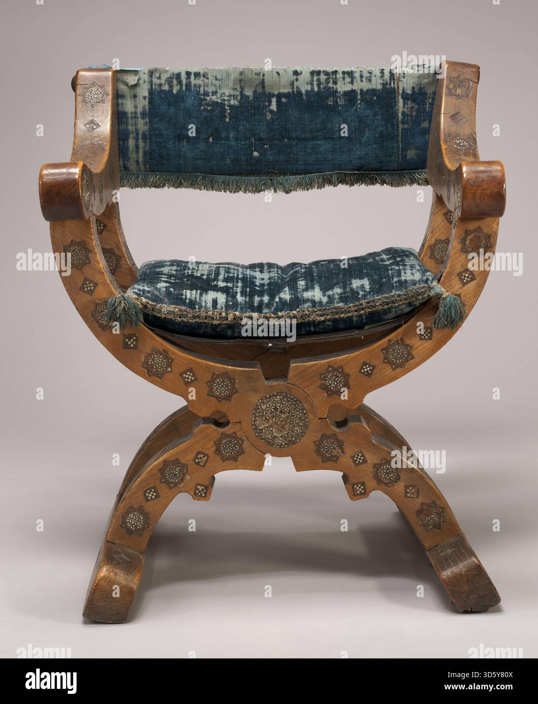 This 15th-century Lombard Dantesca chair is made of elm with velvet ...