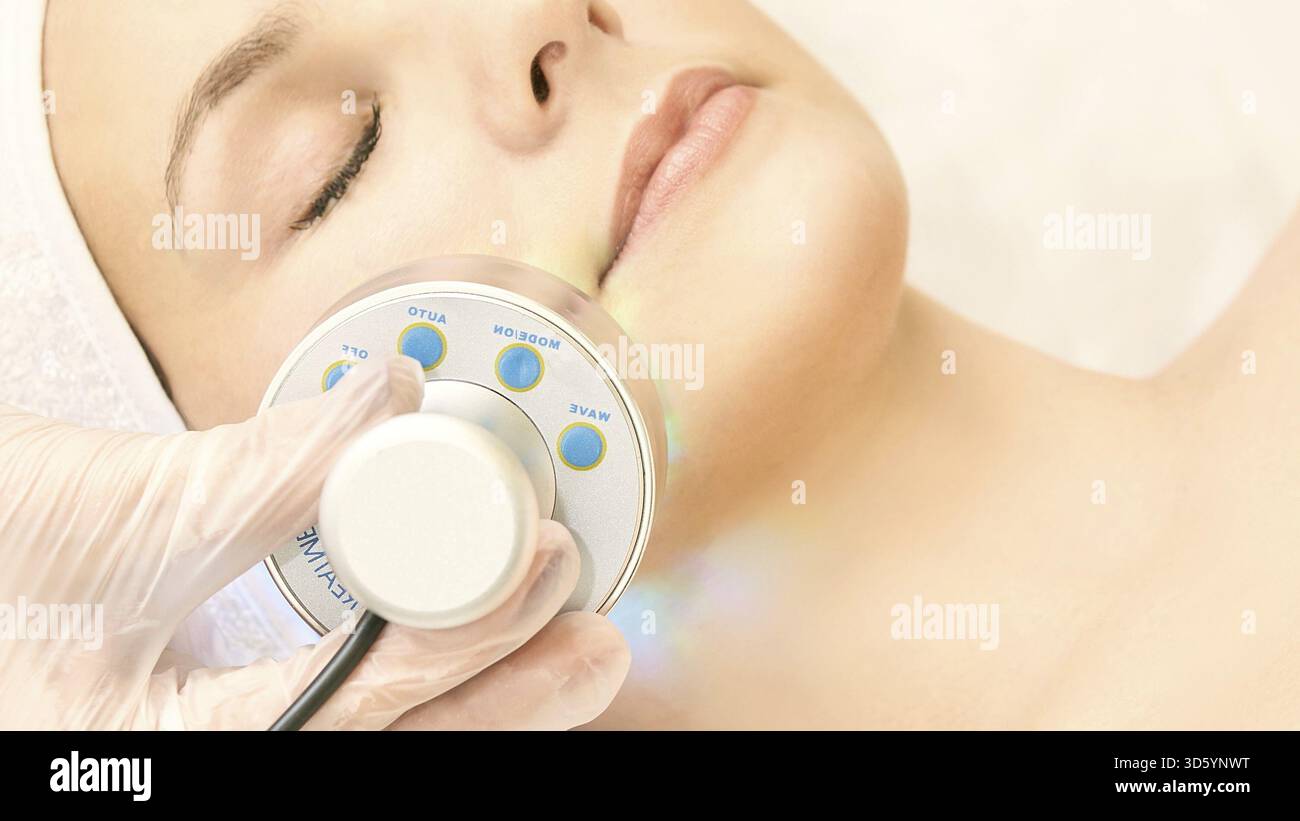 Infared Face Light infrared therapy. Cosmetology head procedure. Beauty woman face ...