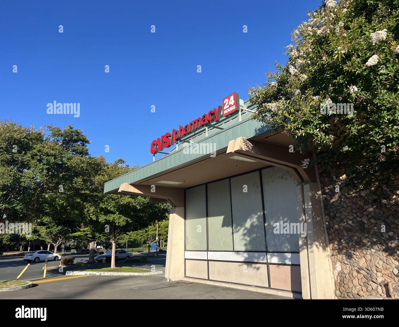 Exterior of a CVS Pharmacy with 24-hour signage on a clear day, Santa ...