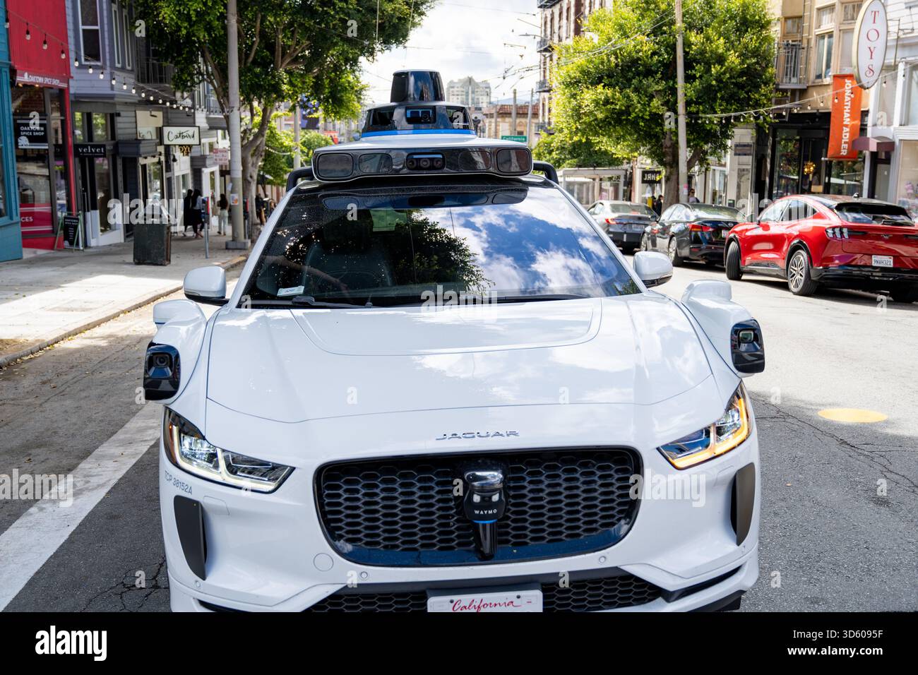 Waymo Rear Roof Front view of Waymo autonomous Jaguar I-PACE with roof-mounted sensors ...