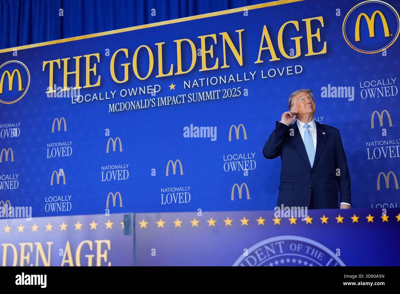 President Donald Trump arrives to speak at the McDonald's Impact Summit ...