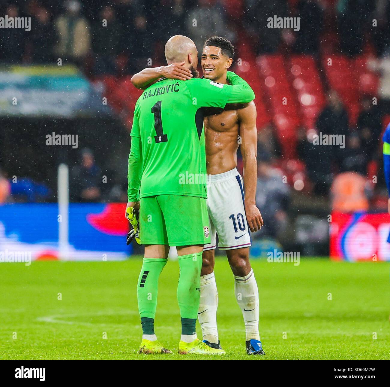 London, UK. 13th Nov, 2025.Serbia's goalkeeper Predrag Rajkovic and England's Jude Bellingham after the match. Stock Photo