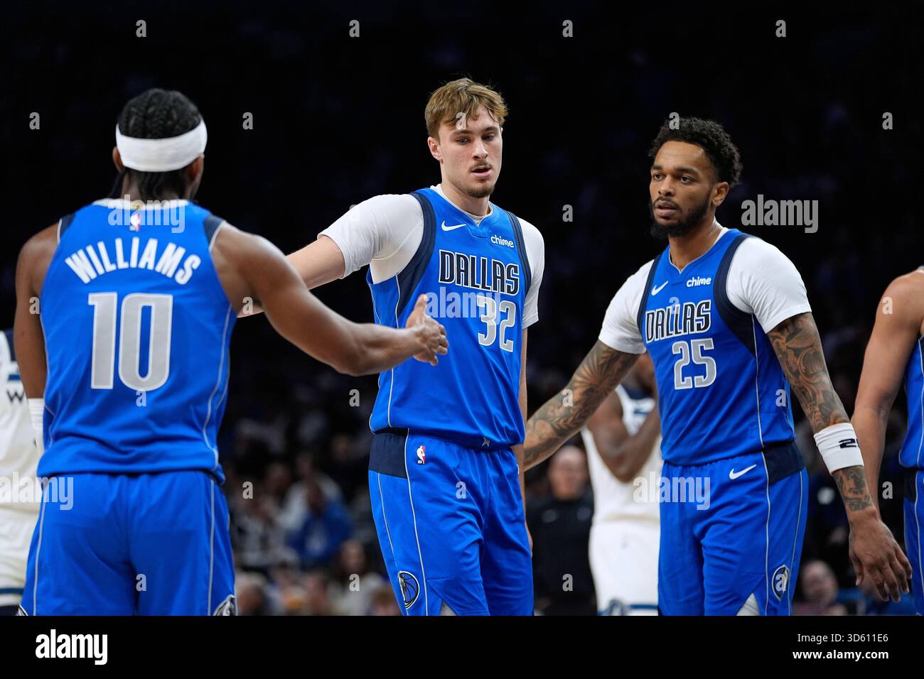 Dallas Mavericks guard Brandon Williams (10), forward Cooper Flagg (32