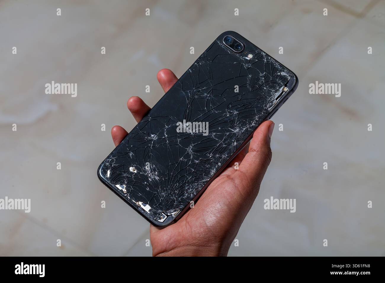 Cracked mobile phone display screen Stock Photo